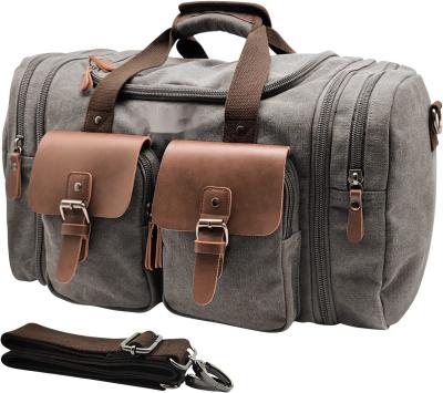 China Canvas Genuine Leather Carry On Travel Bag Large Capacity 50L Expandable for sale