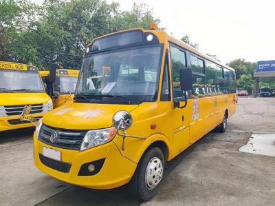 China Diesel Euro 4 Autobús escolar jubilado Dongfeng 56 asientos Autobús escolar amarillo en venta