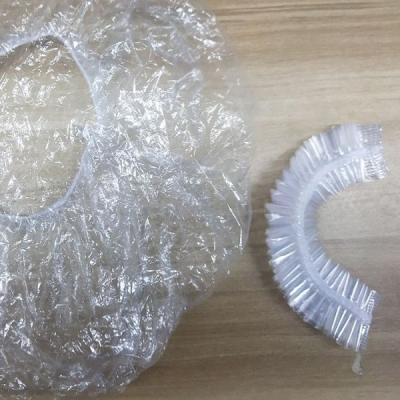 中国 PEのプラスチック透明で使い捨て可能なヘッド帽子の防水大広間のヘア ドライヤの処理 販売のため