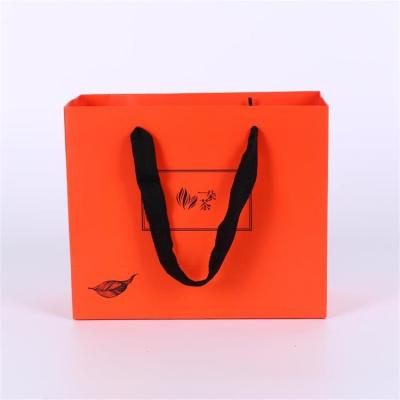 China wholesale cheap custom design shopping paper bags with your own logo,cheap paper bags with your own logo for sale