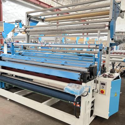 China Horizontal Fabric Inspection Machine Textile Rolling And Cutting Machine for sale