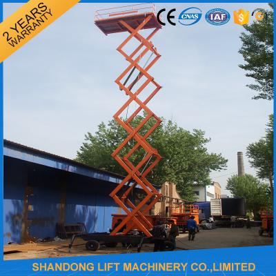 China 12m 500kg Mobile Scissor Lift Tables with Electric Hydraulic Motor Lift Drive for sale
