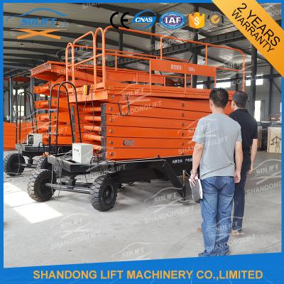 China Hydraulic Electric Mobile Platform Lift Mobile Scissor Lift Table Pull type for sale