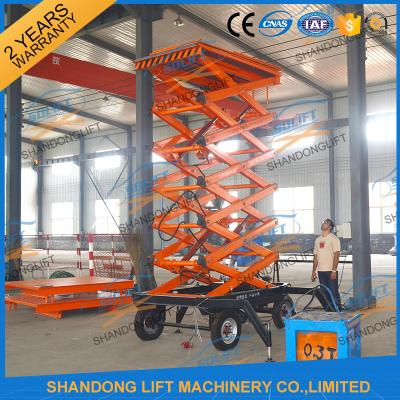 China 300kg 500kg Towed Mobile Mobile Platform Lift Electric Hydraulic 12m Lifting Height for sale