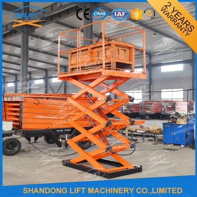 China 1T Stationary Scissor Lift Hydraulic Lifting Table Indoor / Outdoor Scissor Cargo Lift Table for sale