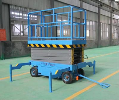 China 300kg 12m Mobile sky scissor lift Platform hydraulic lift scaffolding with CE for sale