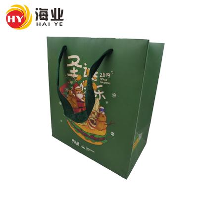 China Recyclable Custom Printed Christmas Gift Paper Bag Christmas Gift Bag Christmas Shopping Bag With Handle for sale