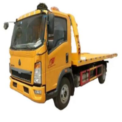 China SINOTRUK HOWO 4x2 Right Hand Drive Car Carrier Wrecker Truck 420HP Flatbed Light Duty Recovery Truck For Road Rescue for sale