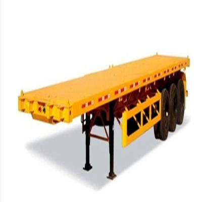 China SINOTRUK HOWO 20 40FT 3Axle 50Ton pesado semirremolque de cama plana Adopta materiales de acero de alta resistencia para el transporte de contenedores en venta