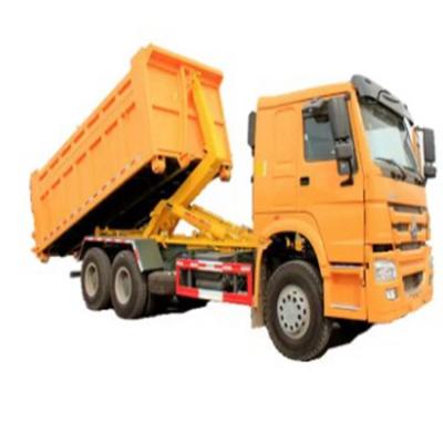 China EURO 2 Camiones de recogida de basura con gancho trasero con contenedor hidráulico con gancho sinotruk Howo 4x2 6x4 20CBM 25CBM 18m3 20m3 en venta