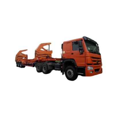 China Sinotruk Howo 8x4 Lastwagen 37 Tonnen Seitenheber Seitenlader Container Anhänger Hebewagen Anhänger Skelett Halbanhänger zu verkaufen