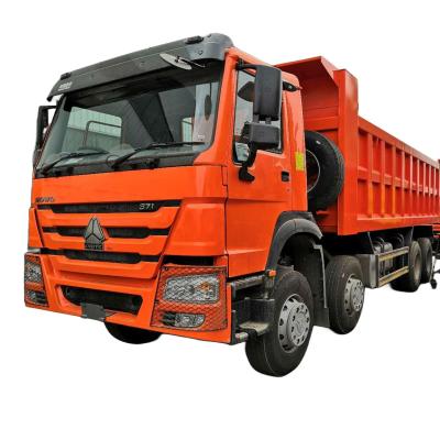 China SINOTRUK HOWO 8*4 12 Tires Cummins Engine Dump Truck For Mine To Tanzania for sale