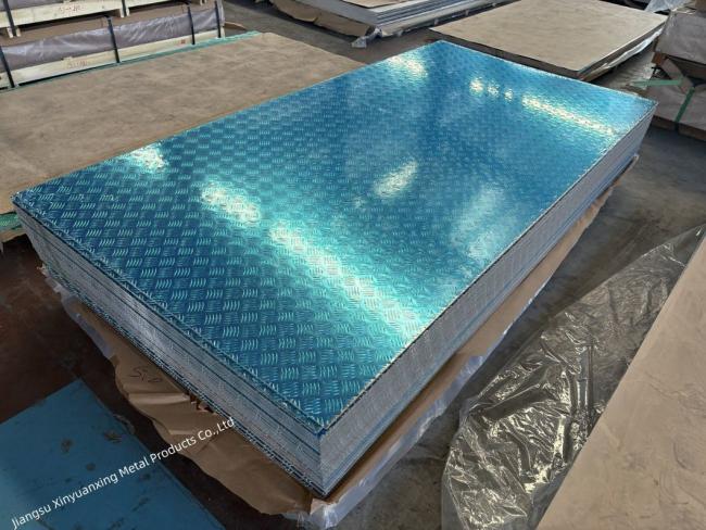 Side profile of patterned aluminum plate showing thickness