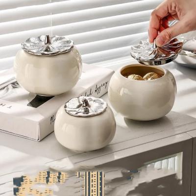 China Cute Persimmon Shaped Tea Coffee Sugar Jar Snack Food Container With Silver Lid Desktop Decorative Crafts Ceramic Storag for sale
