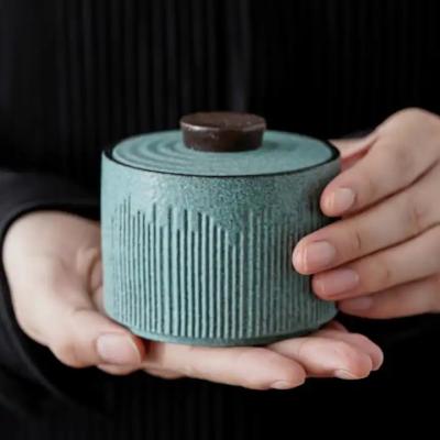 China Small Caddy Ceramic Jars Sealed Jar Decorative Storage Tank Tea Box Portable Candy Jars Tea Can Container Tea Organizer for sale