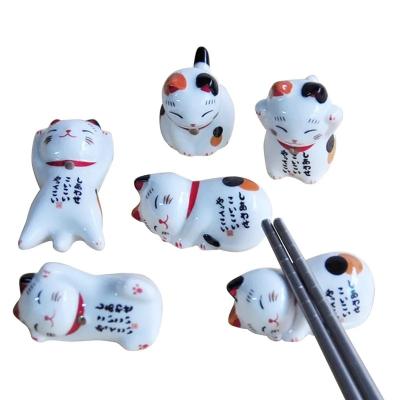 China Cute Financial Lucky Cat Japanese Pen Stand Spoon Fork Rack Chopstick Holder Rest Ceramic Chopstick Holders for sale
