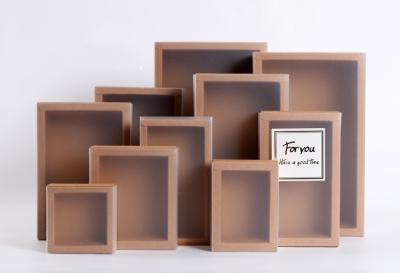 China Hot sell custom made high quality elegant kraft paper box with frosted plastic sleeve for sale