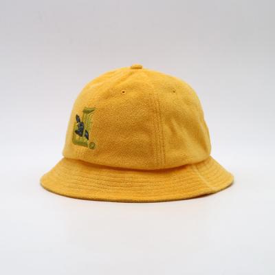 China Flat Embroidery Unisex Bucket Hat Yellow Cotton Fishing Hat for sale