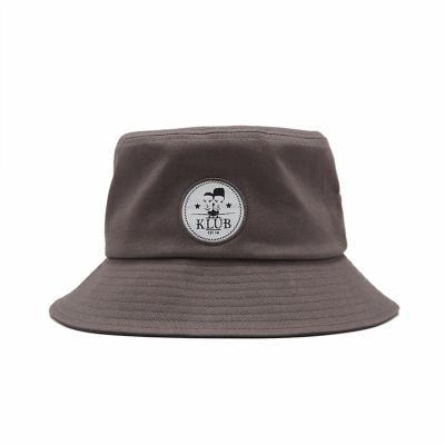 China Unisex Fashion Woven Patch Bucket Hat Summer Fisherman Cap For Teens for sale