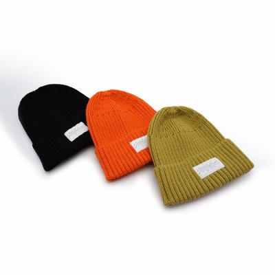 China Knit Cuffed Acrylic Slouchy Beanie Streetwear Private Woven Label Fisherman Skull Hats Winter for sale
