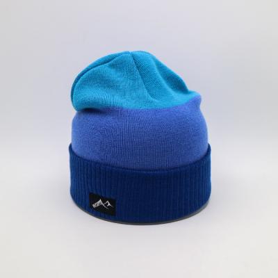 China Custom Knit Beanie Hats Blue Color Warm Winter Blank Pattern for sale