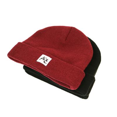 China Custom Embroidery Leather Patch Knit Beanie Hats 100% Acrylic Common Fabric for sale