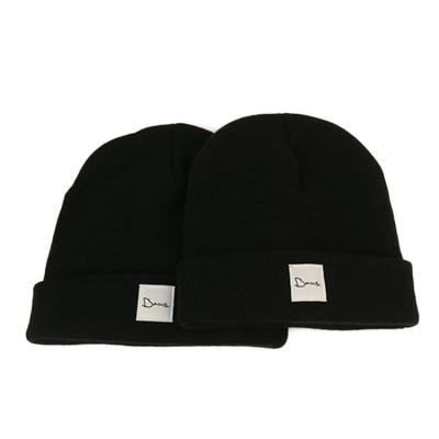 中国 卸し売り注文の帽子はあなた自身の刺繍のロゴによって編まれたラベル100%のアクリルの帽子の帽子/冬の帽子を編みました 販売のため