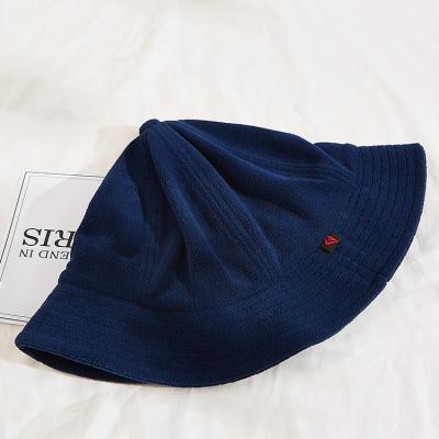 China 52cm Fisherman Bucket Hat Leather Patch Winter Hat Custom Logo for sale