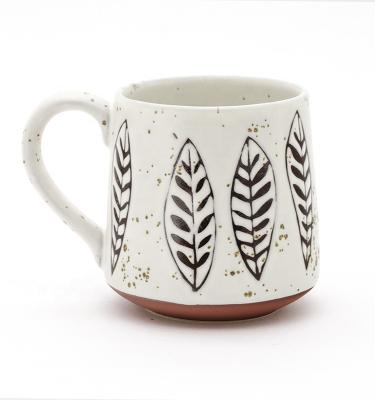 China Taça de café de cerâmica preto e branco geométrica exclusiva para presente à venda
