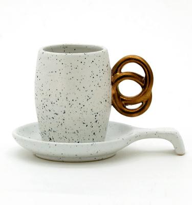 China 3oz de taza de café y platillo de cerámica con mango 3D en venta