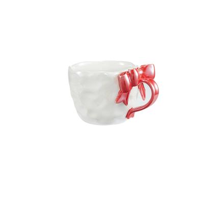 China Parsimonious Bowknot Custom 3d Impressed Ceramic Mug Para aniversário Natal Presente Mugs Cups à venda