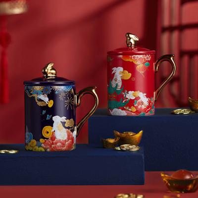 China Taça de cerâmica 3D personalizada Taça azul 3D com alça de ouro Domínio de chá de Natal à venda