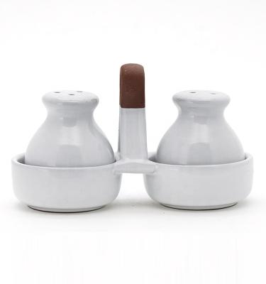 China Contenedor de condimento de cerámica Cruet Set Conchas de sal y pimienta de cerámica Cruet en venta