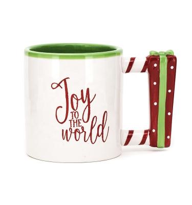 China Tazas de café a granel de Navidad 10OZ taza de cerámica con soporte 3D porcelana vajilla navideña en venta