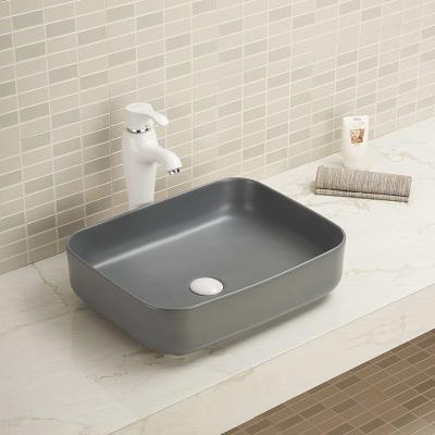 China Small Rectangular Counter Top Wash Basin Porcelain Vessel Sink 20 Inch for sale