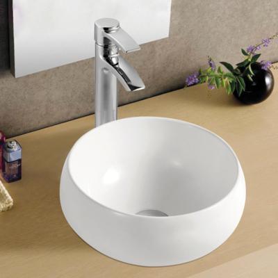 Chine La salle de bains lisse et élégante de plan de travail descendent le lavabo ovale blanc de forme à vendre