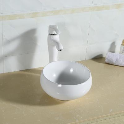 China Oval Above Counter Basin Handmade Ceramic Sinks Sanitary Basin Bathroom for sale