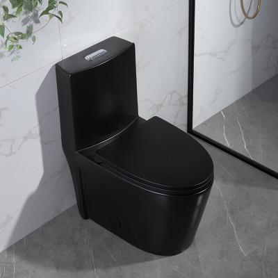 China Matt Black One-Piece Compact Elongated Dual-Flush Toilet With Skirted Trapway for sale