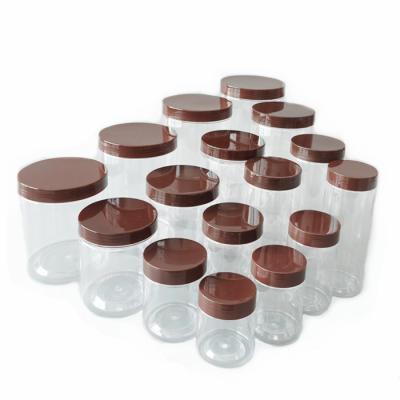 China Dia 85mm Round Plastic Canisters Easy Open Transparent Nuts Storage Jars With Lids for sale