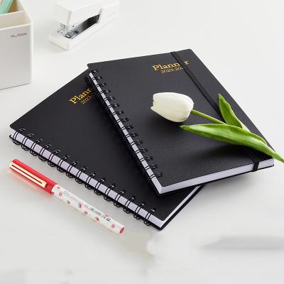 China Cuaderno personalizado A5 Negro Planificador Diario en espiral con logotipo y tamaño personalizados en venta
