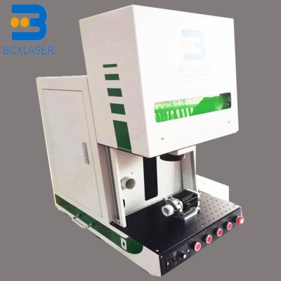 China Enclosed Fiber Laser Marking Machine Gold Silver Jewelry Engraving Cutting 30W 100W for sale