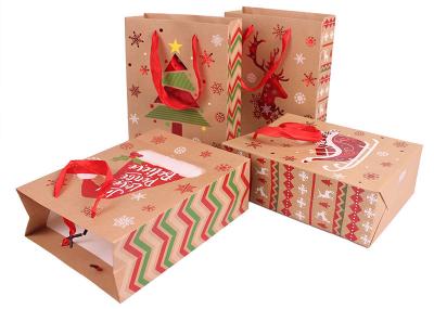 China Printed CCNB Christmas Paper Bags For Xmas Eve Gift Takeaway for sale