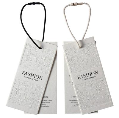 China Gelebor ISO9001 Clothing Tag Label Embossing Clothes Hang Tag Ivory White for sale