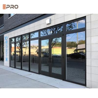 China Commercial Aluminium Glass Hinged Doors Exterior Store Entrance Front Doors for sale
