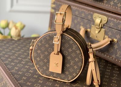 China Ladies Leather 7.5cm Circular Push Lock Crossbody Bag With Mental Ornament for sale