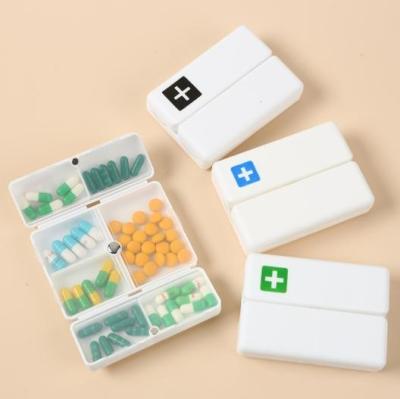 China Promotion Gift Magnet Plastic Foldable Medicine Pill Organizer Box Travel Plastic Medical Box for sale