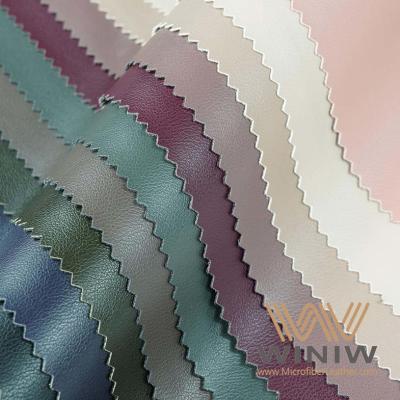 China Tela suave reciclada del cuero del poliuretano de la prenda impermeable de la materia textil de la imitación de cuero en venta