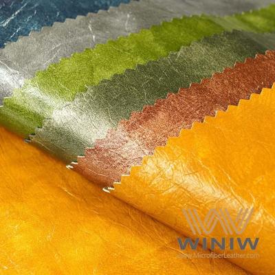 China Tela de couro reciclada impermeável do falso macio de couro do plutônio de matéria têxtil da tela para a roupa à venda