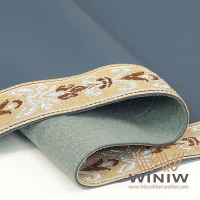 China La prenda impermeable de cuero sintética material del cojín del protector del escritorio de la microfibra grabó en relieve en venta