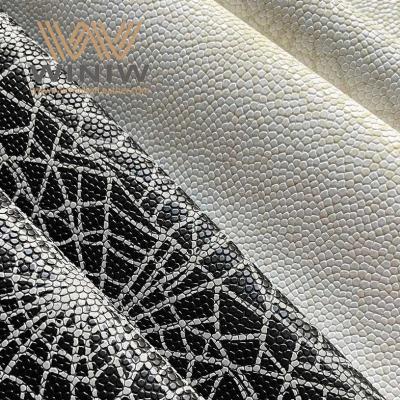 China Material de cuero de la PU del modelo neto blanco negro de la araña para la tela de la imitación de cuero del fútbol por la yarda en venta